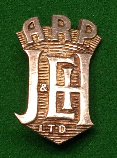 J & EH Ltd ARP Silver Badge.