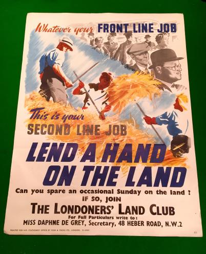 Lend a hand on the Land poster.