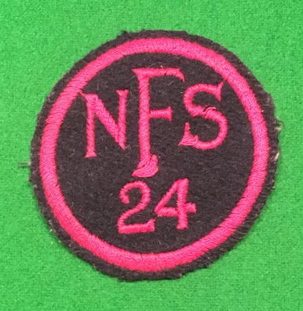 NFS 24 Breast badge.