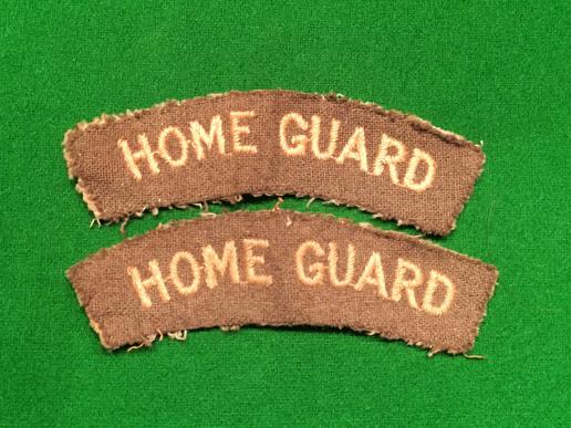 Embroidered Home Guard shoulder titles.