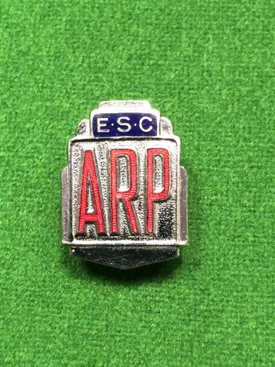 Factory ARP lapel badge.