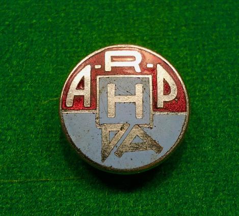 Factory ARP Lapel Badge.