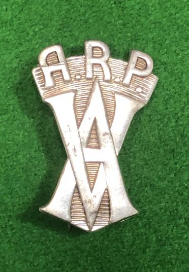 Silver Vickers Armstrong ARP lapel badge.