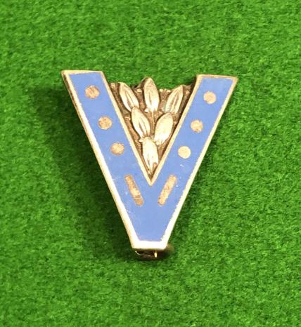 Victory lapel badge.