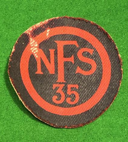 NFS 35 Women's Breast badge.