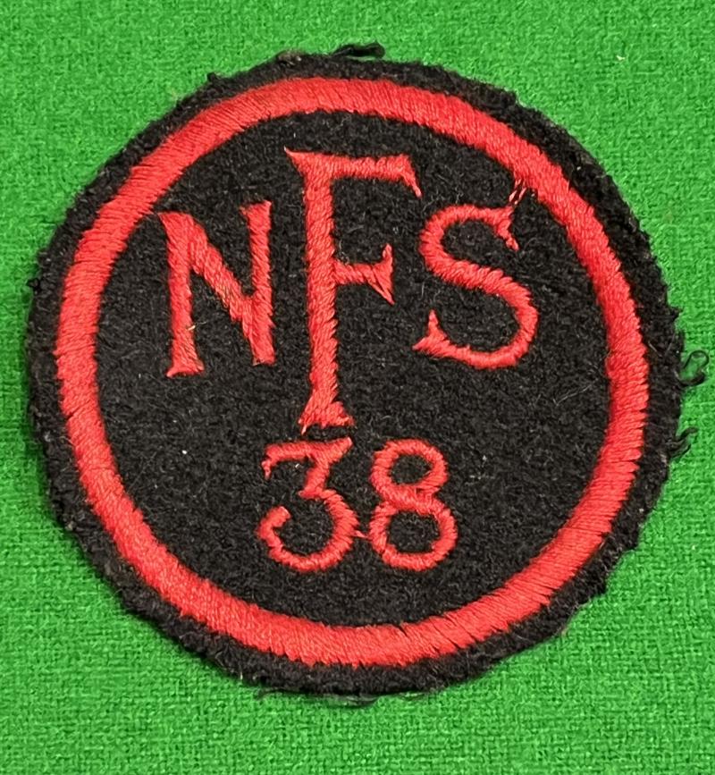 NFS 38 breast badge.