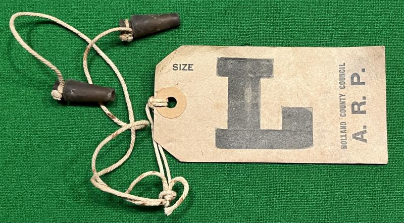 Holland County Council Gas mask label and ear plugs.