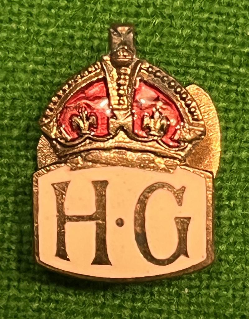 White variation Home Guard lapel badge.