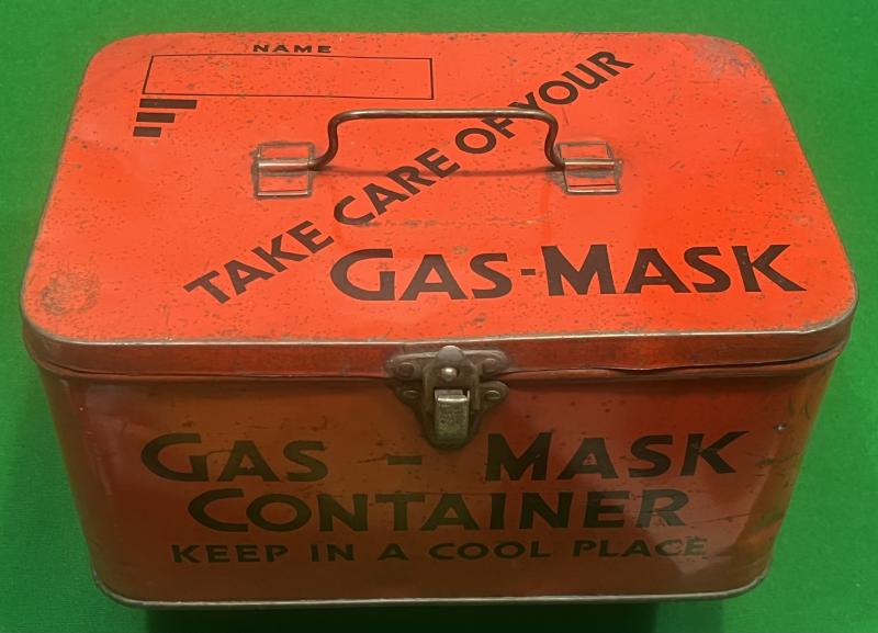 Biscuit tin Gas-mask case.