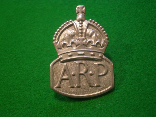 White metal ARP lapel badge.