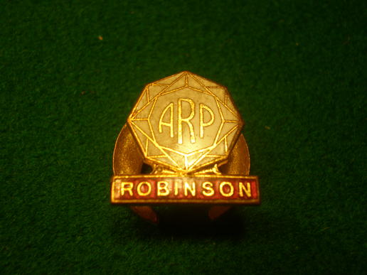 Robinson Company ARP badge,