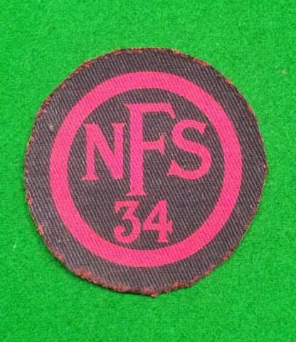 NFS 34 Women's Breast badge.