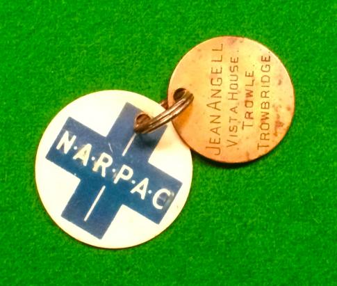 NARPAC animal's collar disc.