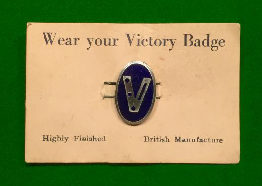 Victory Lapel Badge on Original Sales Card.