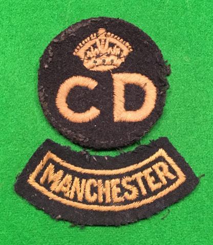 Manchester Civil Defence breast badge and area title.